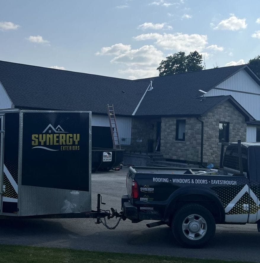 eavestroughing and house exterior installation in Orangeville with Synergy trucks in the foreground