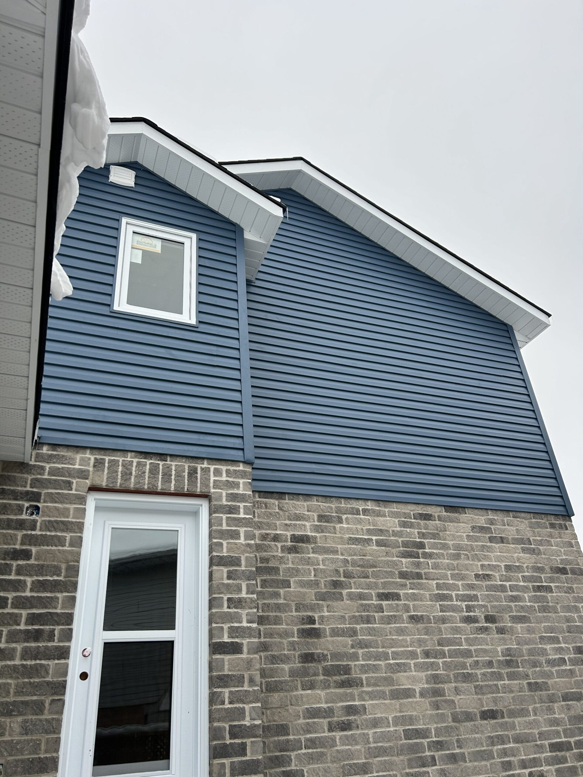 a window installed on a house in orangeville